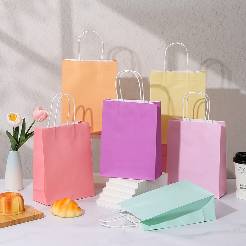 Bolsas de compras de papel Kraft de color caramelo con asas de papel retorcidas