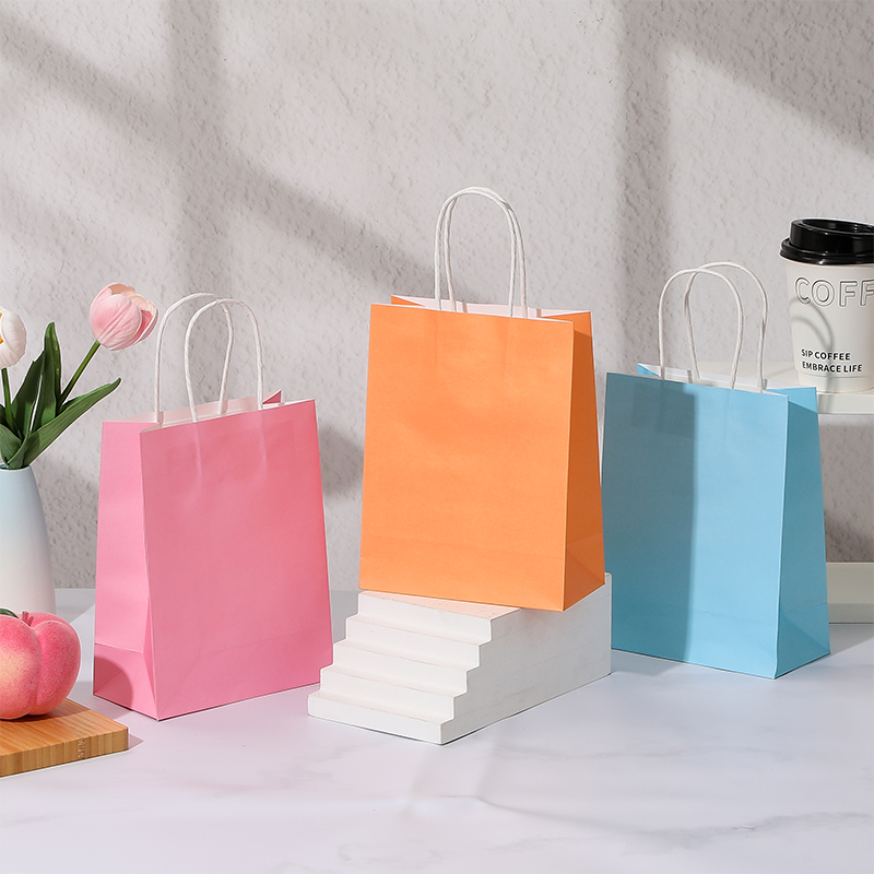 Bolsas de compras de papel Kraft de color caramelo con asas de papel retorcidas