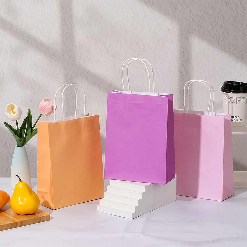 Bolsas de compras de papel Kraft de color caramelo con asas de papel retorcidas