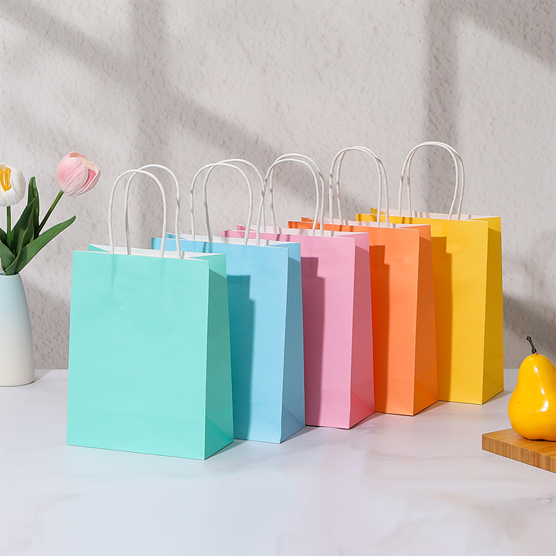 Bolsas de compras de papel Kraft de color caramelo con asas de papel retorcidas