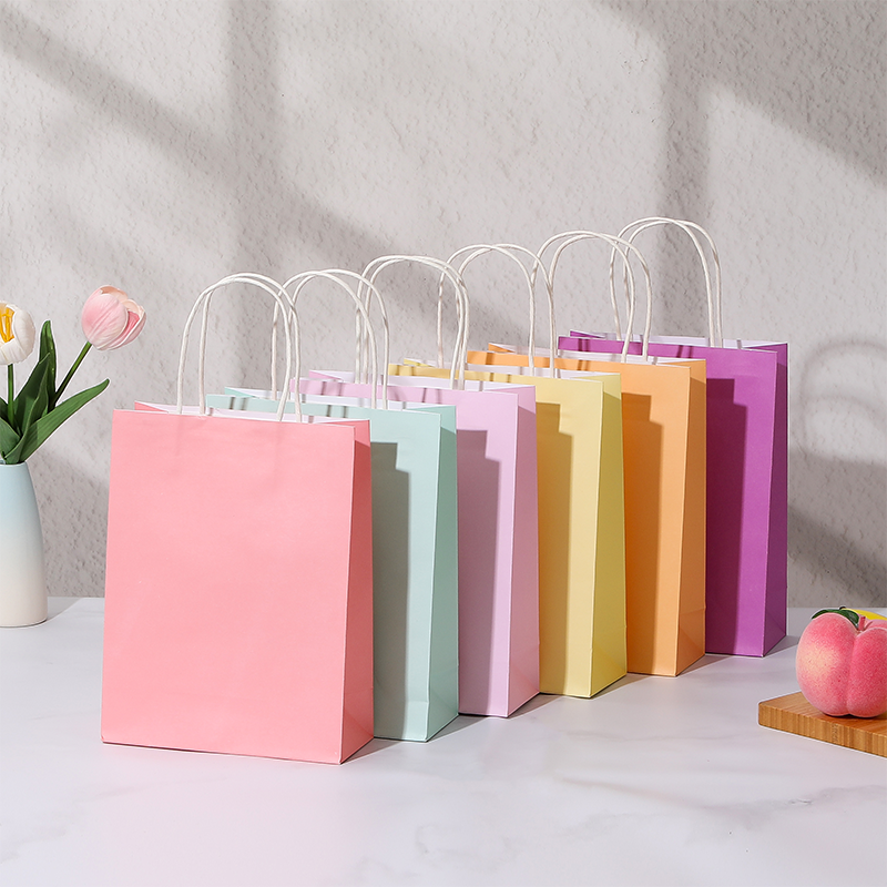 Bolsas de compras de papel Kraft de color caramelo con asas de papel retorcidas