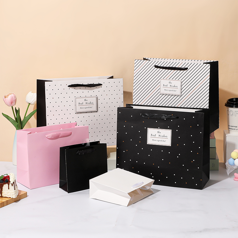 Bolsas de papel de regalo premium para compras minoristas y embalaje de regalos