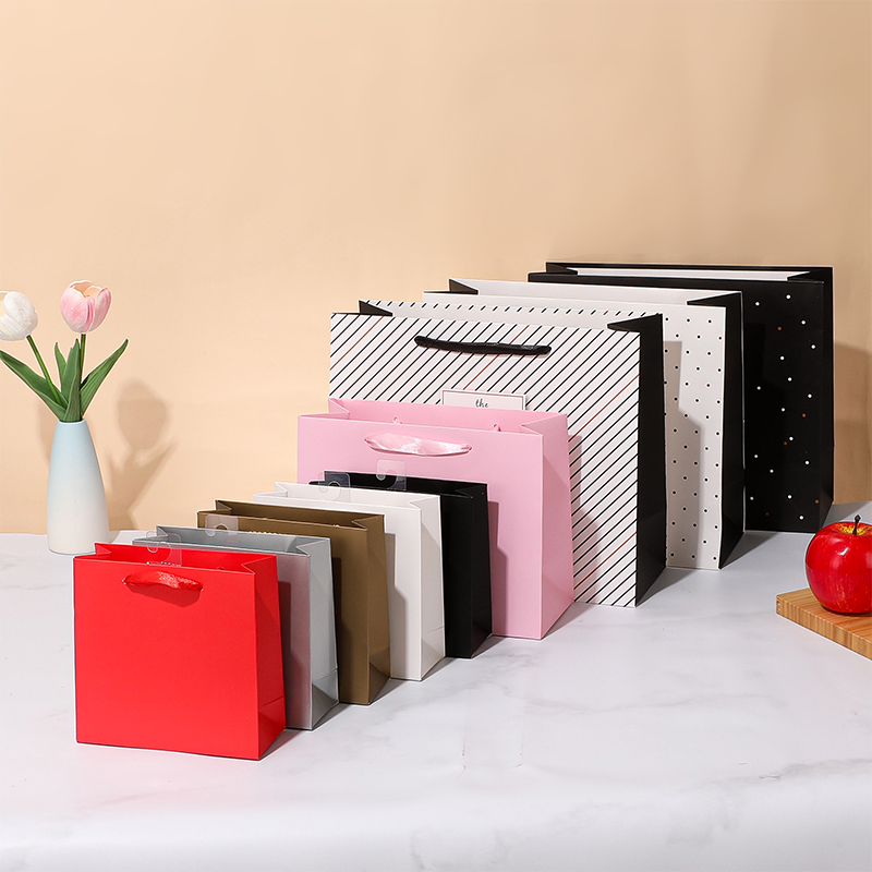 Bolsas de papel de regalo premium para compras minoristas y embalaje de regalos