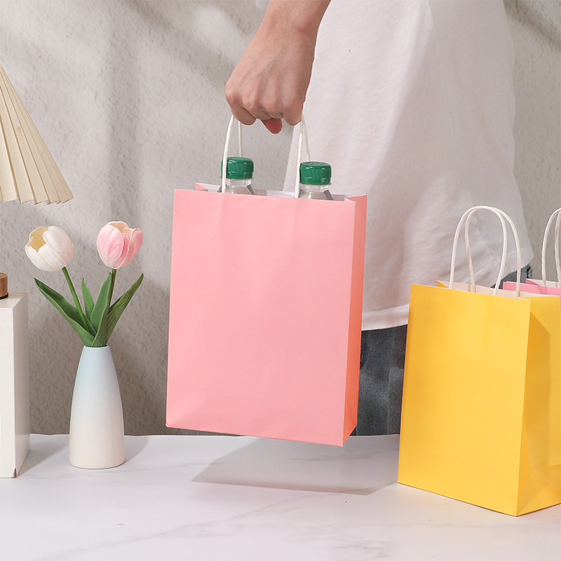 Bolsas de compras de papel Kraft de color caramelo con asas de papel retorcidas